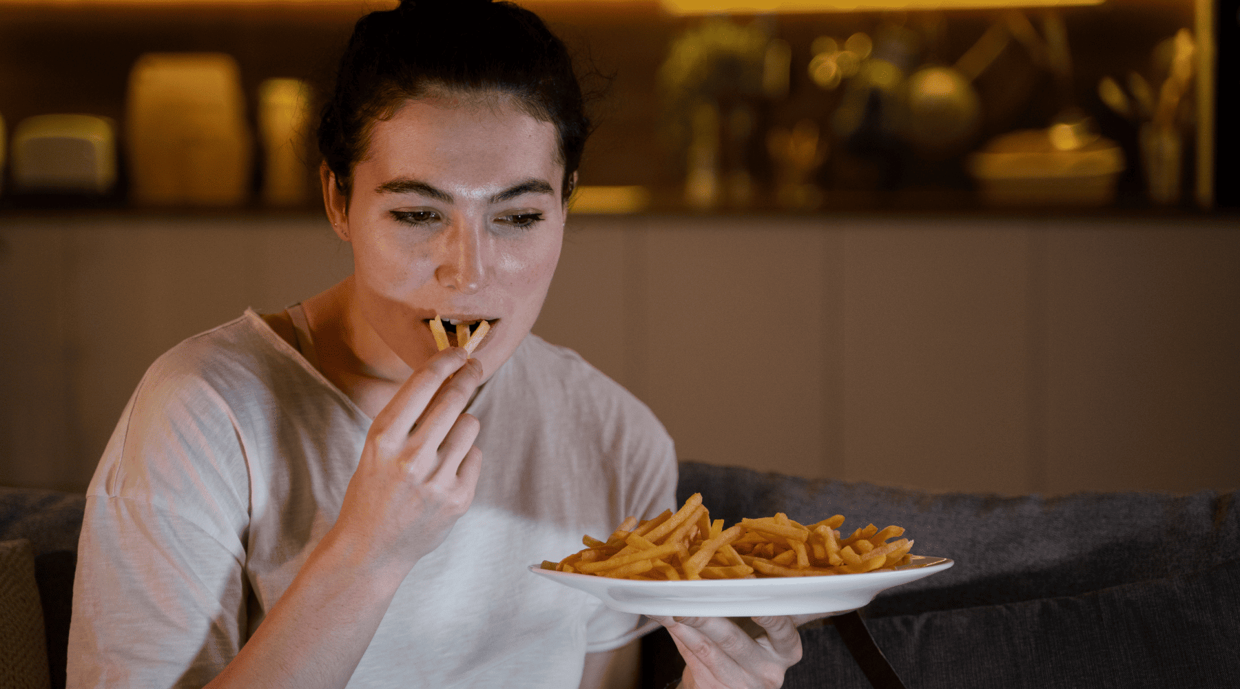 lady eating french fries